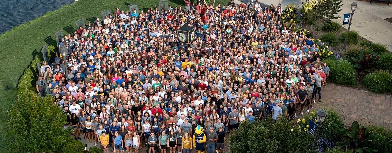 Class of 2025 gathered around the clock outside the SSC