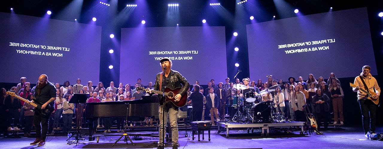 Matt Papa performing with Cedarville singers and musicians in concert in the Jeremiah Chapel